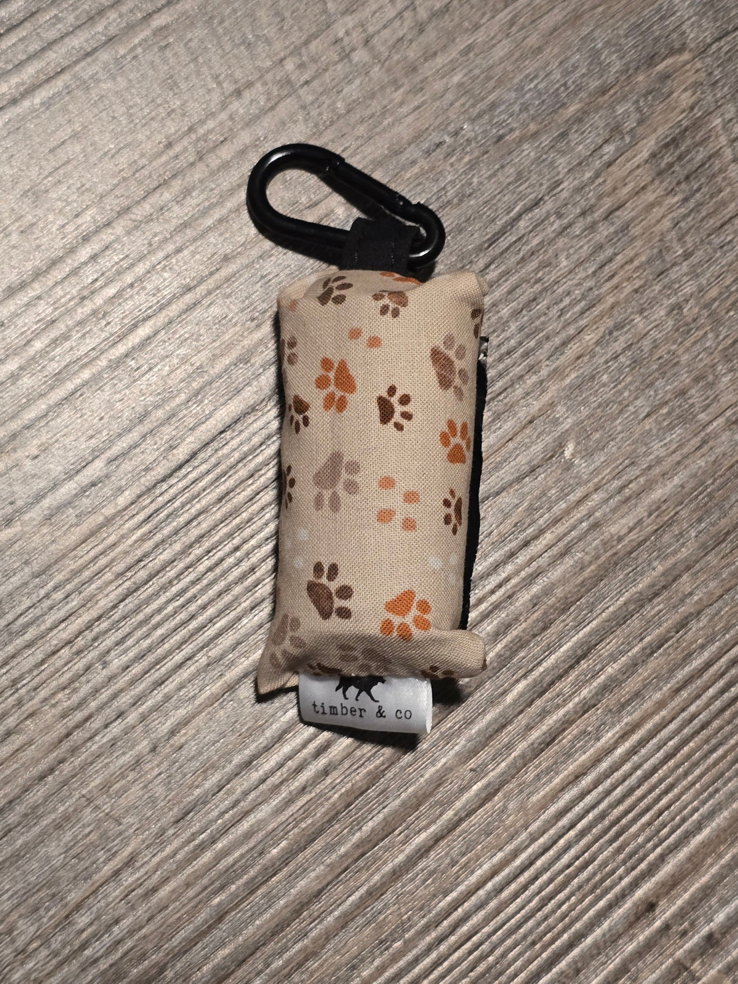 Tan Paw Prints Poop Bag Holder