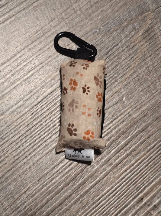 Tan Paw Prints Poop Bag Holder