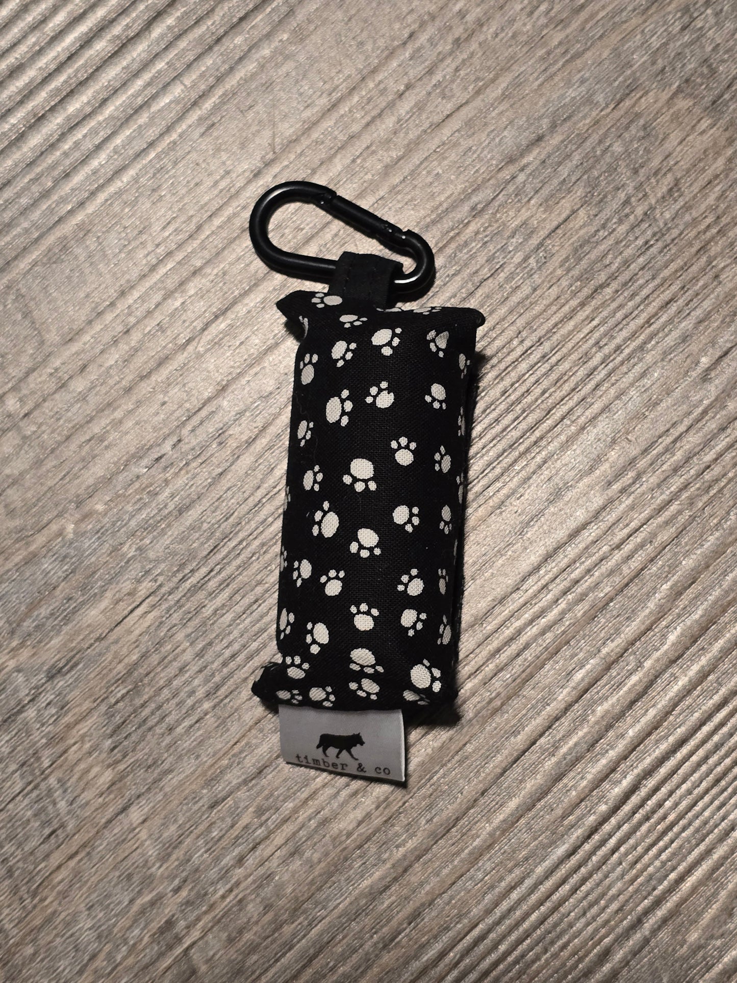 Black Paw Prints Poop Bag Holder