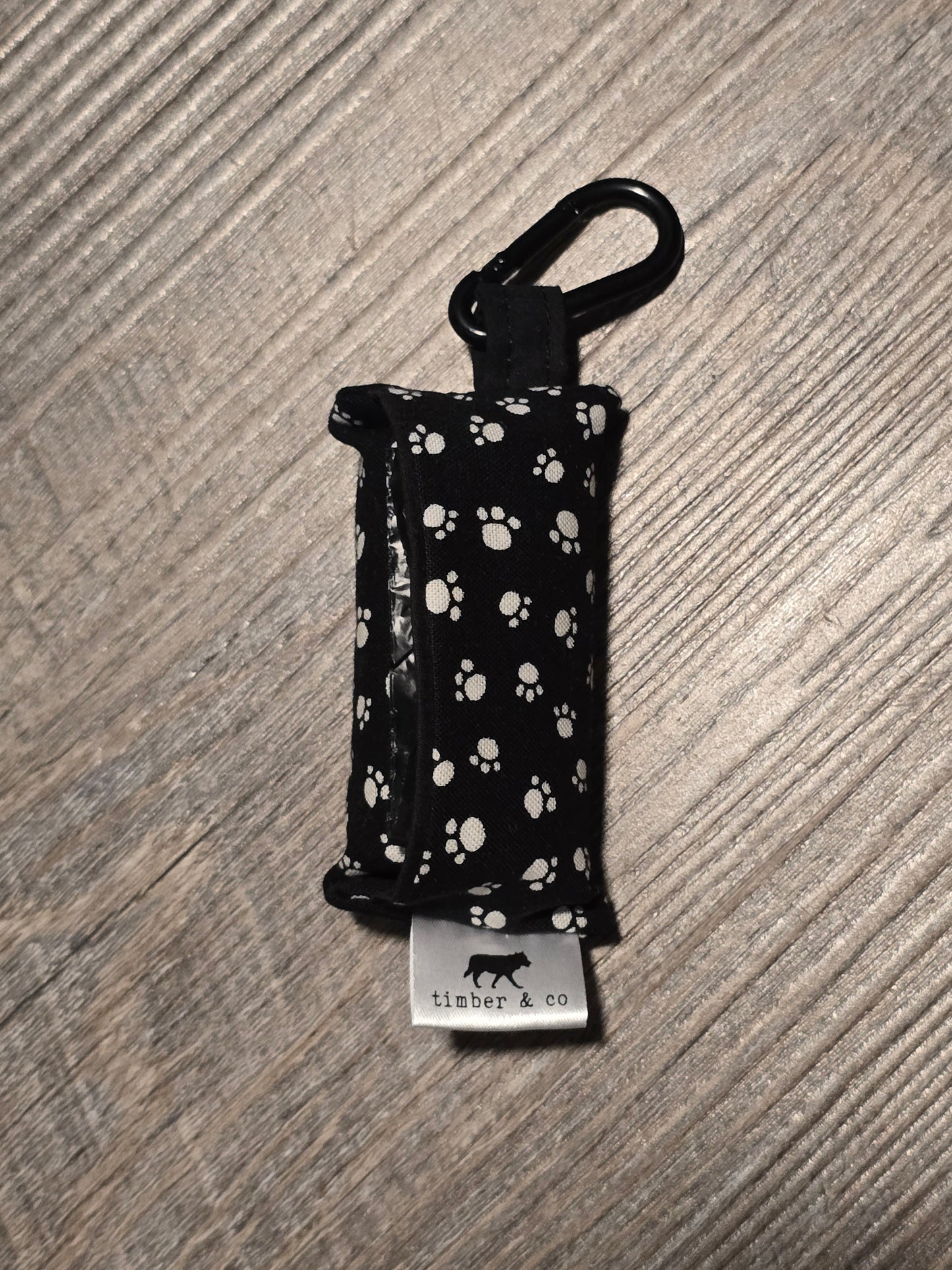 Black Paw Prints Poop Bag Holder