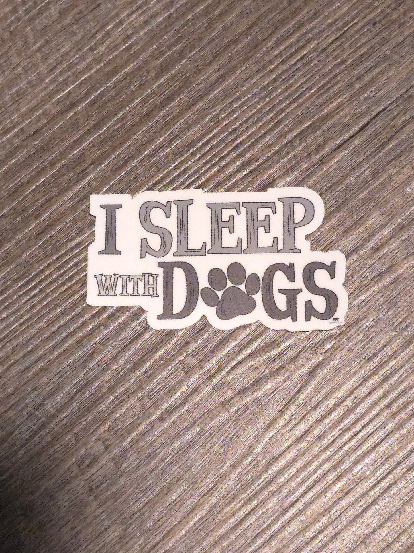 I Sleep With Dogs Sticker